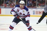 BUFFALO, NY - DECEMBER 26:  Chris Kreider #15 of USA carrirs the puck during the 2011 IIHF World U20 Championship Group A game between USA and Finland on December 26, 2010 at HSBC Arena in Buffalo, New York. (Photo by Tom Szczerbowski/Getty Images)