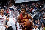 ATLANTA, GA - JANUARY 21:  Ramon Sessions #3 of the Cleveland Cavaliers drives against Jannero Pargo #7 and Ivan Johnson #44 of the Atlanta Hawks at Philips Arena on January 21, 2012 in Atlanta, Georgia.  NOTE TO USER: User expressly acknowledges and agrees that, by downloading and or using this photograph, User is consenting to the terms and conditions of the Getty Images License Agreement.  (Photo by Kevin C. Cox/Getty Images)