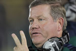 SOUTH BEND, IN - OCTOBER 22:  Head coach Brian Kelly of the Notre Dame Fighting Irish talks to a referee during a game against the University of Southern California Trojans at Notre Dame Stadium on October 22, 2011 in South Bend, Indiana. USC defeated Notre Dame 31-17.  (Photo by Jonathan Daniel/Getty Images)