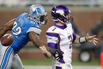 DETROIT, MI - DECEMBER 11:  Cliff Avril #92 of the Detroit Lions causes a first quarter fumble against Christian Ponder #7 of the Minnesota Vikings that ended up being recovered in the end zone for a Lions touchdown at Ford Field on December 11, 2011 in Detroit, Michigan.  (Photo by Gregory Shamus/Getty Images)
