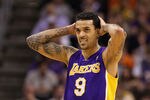PHOENIX, AZ - FEBRUARY 19:  Matt Barnes #9 of the Los Angeles Lakers reacts during the NBA game against the Phoenix Suns at US Airways Center on February 19, 2012 in Phoenix, Arizona.  NOTE TO USER: User expressly acknowledges and agrees that, by downloading and or using this photograph, User is consenting to the terms and conditions of the Getty Images License Agreement.  (Photo by Christian Petersen/Getty Images)