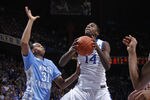 LEXINGTON, KY - DECEMBER 3: Michael Kidd-Gilchrist #14 of the Kentucky Wildcats shoots against John Henson #31 of the North Carolina Tar Heels during their game at Rupp Arena on December 3, 2011 in Lexington, Kentucky. Kentucky won 73-72. (Photo by Joe Robbins/Getty Images)