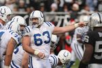 OAKLAND, CA - DECEMBER 16:  Jaff Saturday #63 of the Indianapolis Colts points out the defense during the game against the Oakland Raiders on December 16, 2007 at McAfee Coliseum in Oakland, California. The Colts won 21-14.  (Photo by Stephen Dunn/Getty Images)
