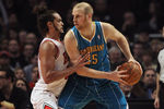 CHICAGO, IL - FEBRUARY 28:  Chris Kaman #35 of the New Orleans Hornets tries to move against Joakim Noah #13 of the Chicago Bulls at the United Center on February 28, 2012 in Chicago, Illinois. The Bulls defeated the Hornets 99-95. NOTE TO USER: User expressly acknowledges and agrees that, by downloading and or using this photograph, User is consenting to the terms and conditions of the Getty Images License Agreement.  (Photo by Jonathan Daniel/Getty Images)