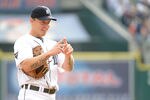 DETROIT, MI - OCTOBER 12:  Brandon Inge #15 of the Detroit Tigers signals prior to Game Four of the American League Championship Series against the Texas Rangers at Comerica Park on October 12, 2011 in Detroit, Michigan.  (Photo by Harry How/Getty Images)