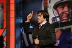 Former Notre Dame quarterback Brady Quinn points to the sky after being selected wth the 22nd pick overall in the 2007 NFL Draft by the Cleveland Browns at the Radio City Music Hall, April 28, 2007. (Photo by Richard Schultz/NFLPhotoLibrary)
