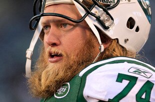 EAST RUTHERFORD, NJ - DECEMBER 11: Nick Mangold #74 of the New York Jets watches from the sideline during the fourth quarter against the Kansas City Chiefs at MetLife Stadium on December 11, 2011 in East Rutherford, New Jersey.  (Photo by Chris Trotman/Getty Images)
