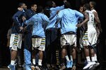 MILWAUKEE, WI - MARCH 03:  Members of the Marquette Golden Eagles hop after player introductions before a game against the Georgetown Hoyas at the Bradley Center on March 3, 2012 in Milwaukee, Wisconsin. Marquette defeated Georgetown 83-69. (Photo by Jonathan Daniel/Getty Images)
