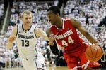 EAST LANSING, MI - MARCH 04: William Buford #44 of the Ohio State Buckeyes drives the ball around Austin Thornton #13 of the Michigan State Spartans during the second half of the game at Breslin Center on March 4, 2012 in East Lansing, Michigan. Ohio State defeated Michigan State Spartans 72-70 and won a share of the Big Ten Title. (Photo by Leon Halip/Getty Images)