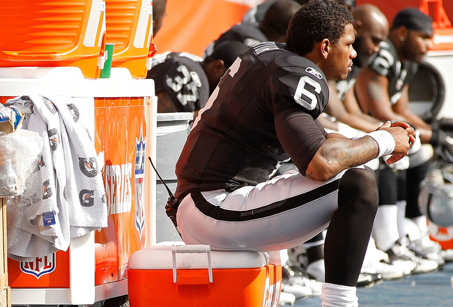 MIAMI GARDENS, FL - DECEMBER 04:  Terrelle Pryor #6 of the Oakland Raiders looks on  during a game against the Miami Dolphins at Sun Life Stadium on December 4, 2011 in Miami Gardens, Florida.  (Photo by Mike Ehrmann/Getty Images)