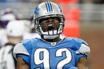 DETROIT, MI - DECEMBER 11:  Cliff Avril #92 of the Detroit Lions reacts after a first quarter sack while playing the Minnesota Vikings at Ford Field on December 11, 2011 in Detroit, Michigan.  (Photo by Gregory Shamus/Getty Images)