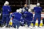 MONTREAL, CANADA - MARCH 3:  New head coach Randy Carlyle of the Toronto Maple Leafs speaks to players during their morning skate prior to facing the Montreal Canadiens at the Bell Centre on March 3, 2012 in Montreal, Quebec, Canada.  (Photo by Richard Wolowicz/Getty Images)