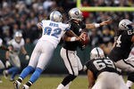 OAKLAND, CA - DECEMBER 18:  Cliff Avril #92 of the Detroit Lions sacks Carson Palmer #3 of the Oakland Raiders in the final minute of their game at O.co Coliseum on December 18, 2011 in Oakland, California.  (Photo by Ezra Shaw/Getty Images)