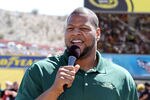 AVONDALE, AZ - MARCH 04:  Ndamukong Suh of the NFL's Detroit Lions is the honorary grand marshall and is the starter for the NASCAR Sprint Cup Series SUBWAY Fresh Fit 500 at Phoenix International Raceway on March 4, 2012 in Avondale, Arizona.  (Photo by Jerry Markland/Getty Images for NASCAR)