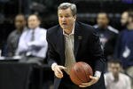 INDIANAPOLIS, IN - MARCH 11:  Head coach Bill Carmody of the Northwestern Wildcats reacts as he coaches against the Ohio State Buckeyes during the quarterfinals of the 2011 Big Ten Men's Basketball Tournament at Conseco Fieldhouse on March 11, 2011 in Indianapolis, Indiana.  (Photo by Andy Lyons/Getty Images)