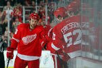 DETROIT, MI - JANUARY 23:  Niklas Kronwall #55 of the Detroit Red Wings celebrates his goal against the St. Louis Blues with his teammates during their NHL game at Joe Louis Arena on January 23, 2012 in Detroit, Michigan.  (Photo by Dave Sandford/Getty Images)