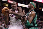 BOSTON, MA - JANUARY 16:  Kendrick Perkins #5 of the Oklahoma City Thunder heads to the net as Jermaine O'Neal #7 of the Boston Celtics defends on January 16, 2012 at TD Garden in Boston, Massachusetts. The Oklahoma City Thunder defeated the Boston Celtics 97-88. NOTE TO USER: User expressly acknowledges and agrees that, by downloading and or using this photograph, User is consenting to the terms and conditions of the Getty Images License Agreement.  (Photo by Elsa/Getty Images)
