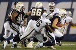SAN DIEGO, CA - NOVEMBER 10: Defensive lineman  Kamerion Wimbley #96 of the Oakland Raiders sacks quarterback  Philip Rivers #17 of the San Diego Chargers in the first half at Qualcomm Stadium on November 10, 2011 in San Diego, California.  (Photo by Harry How/Getty Images)