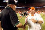 MIAMI - OCTOBER 12:  Head coach Rex Ryan of the New York Jets congratulates head coach Tony Sparano of the Miami Dolphins at Land Shark Stadium on October 12, 2009 in Miami, Florida. The Dolphins defeated the Jets 31-27.  (Photo by Doug Benc/Getty Images)