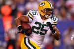 EAST RUTHERFORD, NJ - DECEMBER 04:  Ryan Grant #25 of the Green Bay Packers runs with the ball against the New York Giants at MetLife Stadium on December 4, 2011 in East Rutherford, New Jersey.  (Photo by Al Bello/Getty Images)