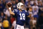 INDIANAPOLIS, IN - JANUARY 08:  Quarterback Peyton Manning #18 of the Indianapolis Colts passes the ball in the first quarter against the New York Jets during their 2011 AFC wild card playoff game at Lucas Oil Stadium on January 8, 2011 in Indianapolis, Indiana.  (Photo by Jonathan Daniel/Getty Images)