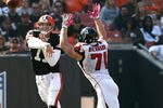 CLEVELAND - OCTOBER 10:  Quarterback Jake Delhomme #17 of the Cleveland Browns throws to a receiver as he is pressured by outside tackle Kroy Biermann #71 of the Atlanta Falcons at Cleveland Browns Stadium on October 10, 2010 in Cleveland, Ohio.  (Photo by Matt Sullivan/Getty Images)