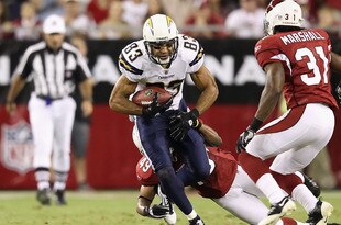GLENDALE, AZ - AUGUST 27:  Wide receiver Vincent Jackson #83 of the San Diego Chargers runs with the football after a reception against the Arizona Cardinals during the preseason NFL game at the University of Phoenix Stadium on August 27, 2011 in Glendale, Arizona.  The Chargers defeated the Cardinals 34-31.(Photo by Christian Petersen/Getty Images)
