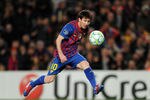 BARCELONA, SPAIN - MARCH 07: Lionel Messi of FC Barcelona scores his sides opening goal during the UEFA Champions League Round of 16 second leg match between FC Barcelona and Bayern 04 Leverkusen at the Camp Nou stadium on March 7, 2012 in Barcelona, Spain.  (Photo by Jasper Juinen/Getty Images)