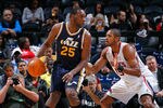 ATLANTA - NOVEMBER 12:  Al Jefferson #25 of the Utah Jazz against Al Horford #15 of the Atlanta Hawks at Philips Arena on November 12, 2010 in Atlanta, Georgia.  NOTE TO USER: User expressly acknowledges and agrees that, by downloading and/or using this Photograph, User is consenting to the terms and conditions of the Getty Images License Agreement.  (Photo by Kevin C. Cox/Getty Images)