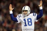 FOXBORO, MA - NOVEMBER 21:  Peyton Manning #18 of the Indianapolis Colts celebrates a touchdown in the fourth quarter against the New England Patriots on November 21, 2010 at Gillette Stadium in Foxboro, Massachusetts. The Patriots defeated the Colts 31-28. (Photo by Elsa/Getty Images)