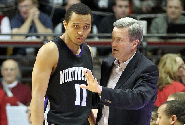 BLOOMINGTON, IL - FEBRUARY 15: Bill Carmody the head coach of the Northwestern Wildcats talks with Reggie Hearn #11 during the Big Ten Conference game against the Indiana Hoosiers at Assembly Hall on February 15, 2012 in Bloomington, Indiana.  (Photo by Andy Lyons/Getty Images)