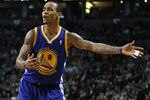 BOSTON, MA - MARCH 04:  Monta Ellis #8 of the Golden State Warriors reacts after the ball is given to the Boston Celtics on March 4, 2011 at the TD Garden in Boston, Massachusetts.  The Celtics defeated the Warriors 107-103. NOTE TO USER: User expressly acknowledges and agrees that, by downloading and/or using this Photograph, User is consenting to the terms and conditions of the Getty Images License Agreement.  (Photo by Elsa/Getty Images)
