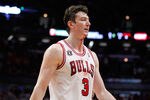 CHICAGO, IL - MAY 18:  Blood drips from the neck of Omer Asik #3 of the Chicago Bulls after he drew contact against the Miami Heat in Game Two of the Eastern Conference Finals during the 2011 NBA Playoffs on May 18, 2011 at the United Center in Chicago, Illinois. NOTE TO USER: User expressly acknowledges and agrees that, by downloading and or using this photograph, User is consenting to the terms and conditions of the Getty Images License Agreement.  (Photo by Gregory Shamus/Getty Images)