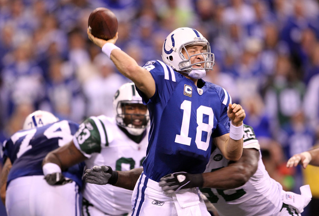 INDIANAPOLIS, IN - JANUARY 08:  Quarterback Peyton Manning #18 of the Indianapolis Colts throws a pss under pressure against the New York Jets during their 2011 AFC wild card playoff game at Lucas Oil Stadium on January 8, 2011 in Indianapolis, Indiana. The Jets won 17-16.  (Photo by Andy Lyons/Getty Images)