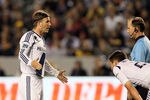 CARSON, CA - MARCH 10:  David Beckham #23 of the Los Angeles Galaxy pleads his case to referee Kevin Stott in the first half during the MLS match between Real Salt Lake and the Los Angeles Galaxy at The Home Depot Center on March 10, 2012 in Carson, California.  (Photo by Victor Decolongon/Getty Images)