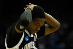 CHARLOTTE, NC - MARCH 18:  Jamal Olasewere #1 of the Long Island Blackbirds reacts late in the second half while taking on the North Carolina Tar Heels during the second round of the 2011 NCAA men's basketball tournament at Time Warner Cable Arena on March 18, 2011 in Charlotte, North Carolina.  (Photo by Kevin C. Cox/Getty Images)