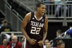 KANSAS CITY, MO - MARCH 07:  Khris Middleton #22 of the Texas A&M Aggies celebrates after scoring during the first round of the Big 12 Basketball Tournament against the Oklahoma Sooners on March 7, 2012 at the Sprint Center in Kansas City, Missouri.  (Photo by Jamie Squire/Getty Images)