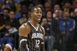 OKLAHOMA CITY, OK - DECEMBER 25:  Dwight Howard #12 of the Orlando Magic questions a call during the NBA season opening game against the Oklahoma City Thunder December 25, 2011 at the Chesapeake Energy Arena in Oklahoma City, Oklahoma.  Oklahoma City defeated Orlando 97-89. NOTE TO USER: User expressly acknowledges and agrees that, by downloading and or using this Photograph, user is consenting to the terms and conditions of the Getty Images License Agreement.  (Photo by Brett Deering/Getty Images)