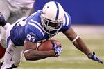 INDIANAPOLIS - SEPTEMBER 19:  Reggie Wayne #87 of the Indianapolis Colts dives for extra yards during the NFL game against the New York Giants  at Lucas Oil Stadium on September 19, 2010 in Indianapolis, Indiana.  (Photo by Andy Lyons/Getty Images)
