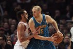 CHICAGO, IL - FEBRUARY 28:  Chris Kaman #35 of the New Orleans Hornets tries to move against Joakim Noah #13 of the Chicago Bulls at the United Center on February 28, 2012 in Chicago, Illinois. The Bulls defeated the Hornets 99-95. NOTE TO USER: User expressly acknowledges and agrees that, by downloading and or using this photograph, User is consenting to the terms and conditions of the Getty Images License Agreement.  (Photo by Jonathan Daniel/Getty Images)