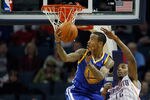CHARLOTTE, NC - JANUARY 14:  Monta Ellis #8 of the Golden State Warriors shoots the ball over Tyrus Thomas #12 of the Charlotte Bobcats during their game at Time Warner Cable Arena on January 14, 2012 in Charlotte, North Carolina.  NOTE TO USER: User expressly acknowledges and agrees that, by downloading and or using this photograph, User is consenting to the terms and conditions of the Getty Images License Agreement.  (Photo by Streeter Lecka/Getty Images)
