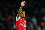 LONDON, ENGLAND - MARCH 12:   Theo Walcott of Arsenal waves to the fans at the final whistle during the Barclays Premier League match between Arsenal and Newcastle United at Emirates Stadium on March 12, 2012 in London, England.  (Photo by Mike Hewitt/Getty Images)