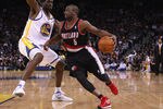 OAKLAND, CA - FEBRUARY 15:  Raymond Felton #5 of the Portland Trail Blazers drives on Ekpe Udoh #20 of the Golden State Warriors at Oracle Arena on February 15, 2012 in Oakland, California. NOTE TO USER: User expressly acknowledges and agrees that, by downloading and or using this photograph, User is consenting to the terms and conditions of the Getty Images License Agreement.  (Photo by Ezra Shaw/Getty Images)