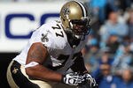CHARLOTTE, NC - NOVEMBER 07:  Carl Nicks #77 of the New Orleans Saints against the Carolina Panthers during their game at Bank of America Stadium on November 7, 2010 in Charlotte, North Carolina.  (Photo by Streeter Lecka/Getty Images)