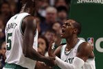 BOSTON, MA - JANUARY 13: Rajon Rondo #9 of the Boston Celtics is helped up by teamamte Kevin Garnett #5 in the fourth quarter against the Chicago Bulls on January 13, 2012 at TD Garden in Boston, Massachusetts. The Chicago Bulls defeated the Boston Celtics 88-79. NOTE TO USER: User expressly acknowledges and agrees that, by downloading and or using this photograph, User is consenting to the terms and conditions of the Getty Images License Agreement.  (Photo by Elsa/Getty Images)