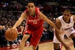LOS ANGELES, CA - DECEMBER 22:  Kevin Martin #12 of the Houston Rockets reaches to control the ball in front of Eric Gordon #10 of the Los Angeles Clippers at Staples Center on December 22, 2010 in Los Angeles, California.  NOTE TO USER: User expressly acknowledges and agrees that, by downloading and or using this photograph, User is consenting to the terms and conditions of the Getty Images License Agreement. (Photo by Stephen Dunn/Getty Images)