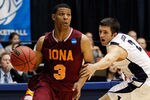 DAYTON, OH - MARCH 13:  Scott Machado #3 of the Iona Gaels drives on Craig Cusick #2 of the Brigham Young Cougars in the second half in the first round of the 2011 NCAA men's basketball tournament at UD Arena on March 13, 2012 in Dayton, Ohio.  (Photo by Gregory Shamus/Getty Images)