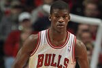 CHICAGO, IL - JANUARY 03:  Jimmy Butler #21 of the Chicago Bulls sets to defend against the Atlanta Hawks at the United Center on January 3, 2012 in Chicago, Illinois. The Bulls defeated the Hawks 76-74. NOTE TO USER: User expressly acknowledges and agrees that, by downloading and or using this photograph, User is consenting to the terms and conditions of the Getty Images License Agreement.  (Photo by Jonathan Daniel/Getty Images)