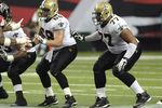 ATLANTA - NOVEMBER 9: Center Matt Lehr #68 and guard Carl Nicks #77 of the New Orleans Saints set to block against the Atlanta Falcons at the Georgia Dome on November 9, 2008 in Atlanta, Georgia.  (Photo by Al Messerschmidt/Getty Images)