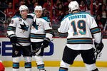 WASHINGTON, DC - FEBRUARY 13:  Joe Pavelski #8 of the San Jose Sharks celebrates with Logan Couture #39 and Joe Thornton #19 after scoring in the second period against the Washington Capitals at the Verizon Center on February 13, 2012 in Washington, DC.  (Photo by Greg Fiume/Getty Images)